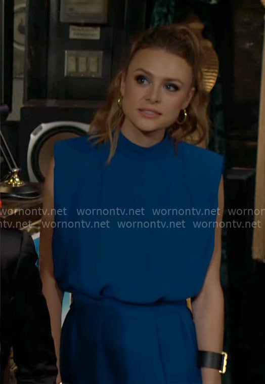 Claire's blue padded shoulder dress on The Young and the Restless