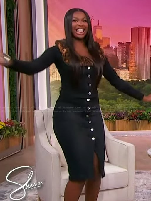 Coco Jones's black faux fur denim jacket on Sherri