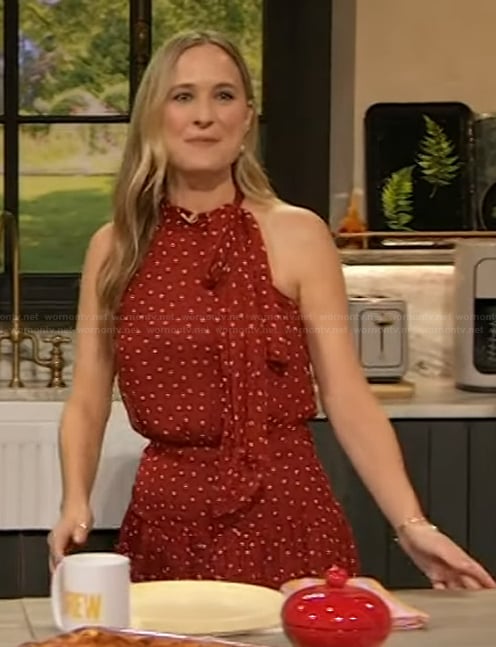 Courtney McBroom's red polka dot tie neck dress on The Drew Barrymore Show