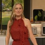 Courtney McBroom’s red polka dot tie neck dress on The Drew Barrymore Show