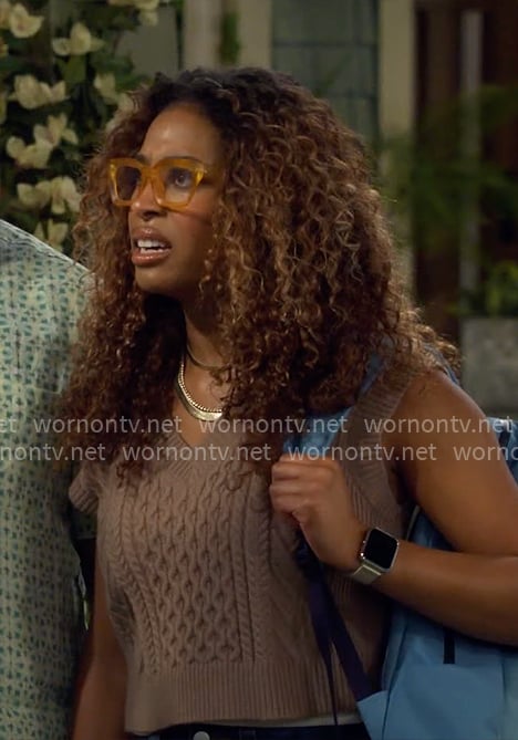 Courtney's brown cable knit sweater vest on The Neighborhood
