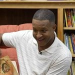 Craig Melvin’s white striped polo on Today