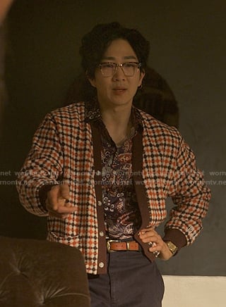 Daniel's orange check cardigan on Reasonable Doubt