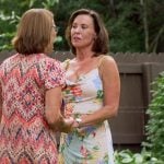 Debbie’s floral print chain strap dress on The Golden Bachelor
