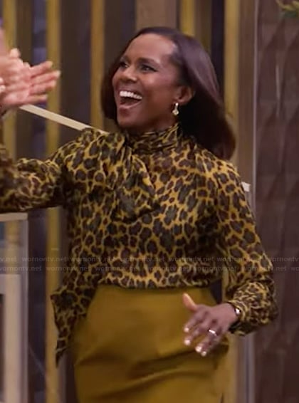 Deborah Roberts’s leopard print tie neck blouse on Live with Kelly and Mark