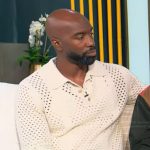 Elliott Cooper’s white open knit polo sweater on Tamron Hall Show
