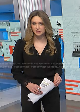 Ellison Barber's black lace cuff blouse on NBC News Daily