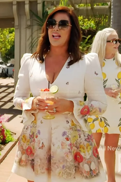 Emily’s white floral print v-neck dress on The Real Housewives of Orange County