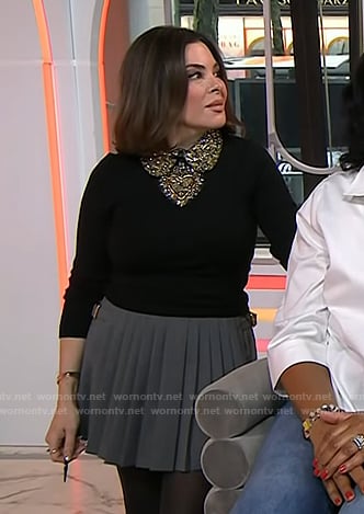 Erica Taylor’s black embellished sweater and grey pleated skirt on Today