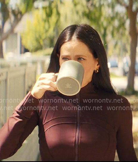 Esther's burgundy jacket on Nobody Wants This