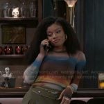 Eva’s sunset print mesh top and green skirt on Beyond the Gates