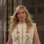 Gemma’s cream floral embroidered top on The Neighborhood