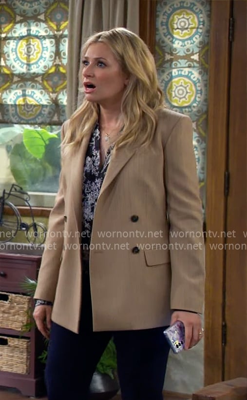 Gemma’s black and white floral blouse on The Neighborhood
