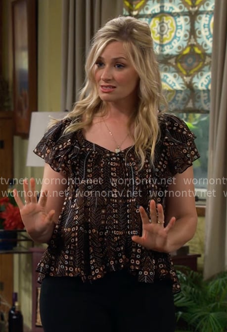 Gemma's black printed top on The Neighborhood