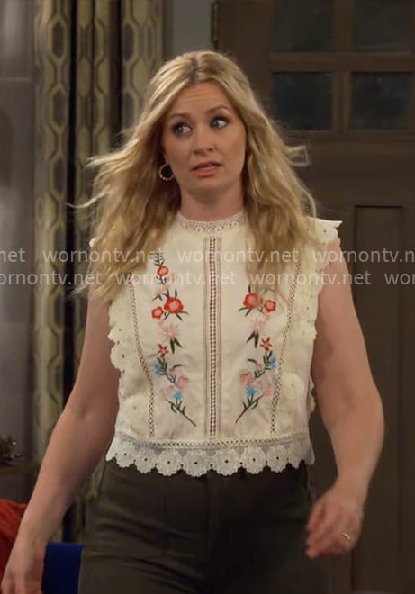 Gemma's cream floral embroidered top on The Neighborhood