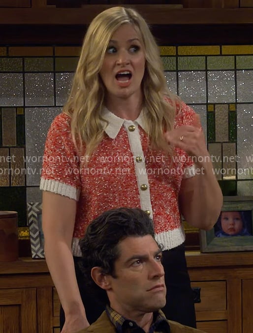 Gemma’s red textured short-sleeve cardigan on The Neighborhood