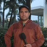 George Solis’s rust orange rain jacket on Today