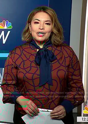Gilma Avalos’s red printed tie neck blouse on NBC News Daily