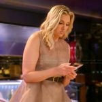 Gina’s sheer sleeveless flare dress on The Real Housewives of Orange County