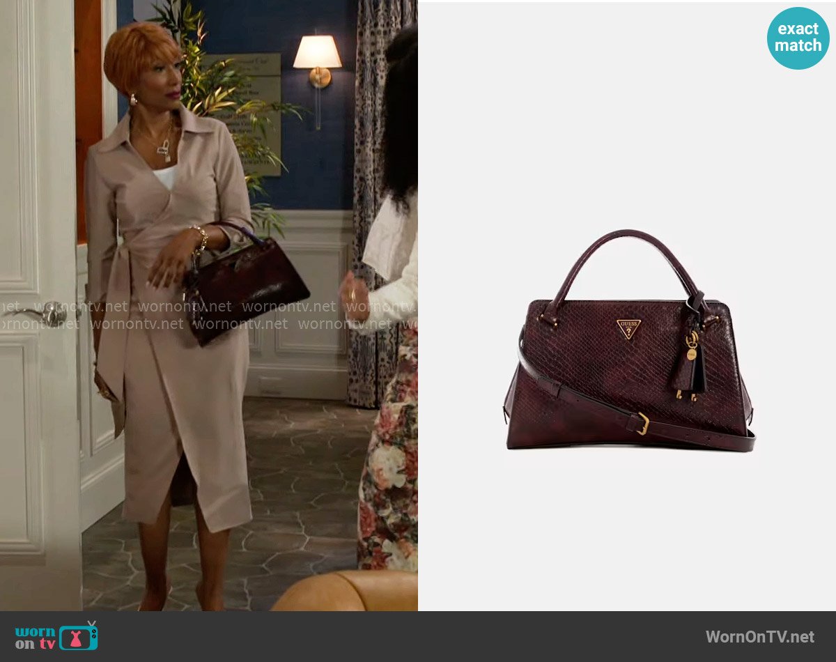 Guess Georgina Satchel worn by Dana 'Leslie' Thomas (Trisha Mann-Grant) on Beyond the Gates