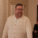 Howard’s beige argyle knit cardigan on Only Murders in the Building