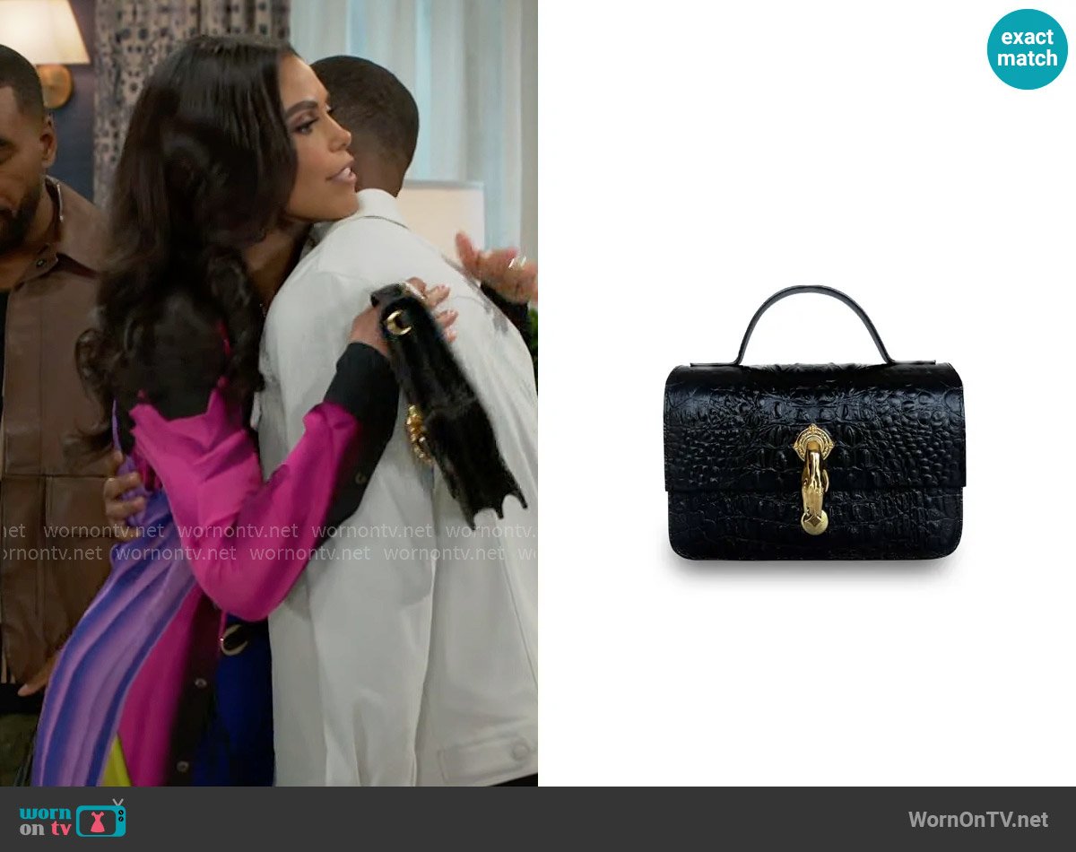 Indigolush Midi Classic Gl Black Bag worn by Dani Dupree (Karla Mosley) on Beyond the Gates