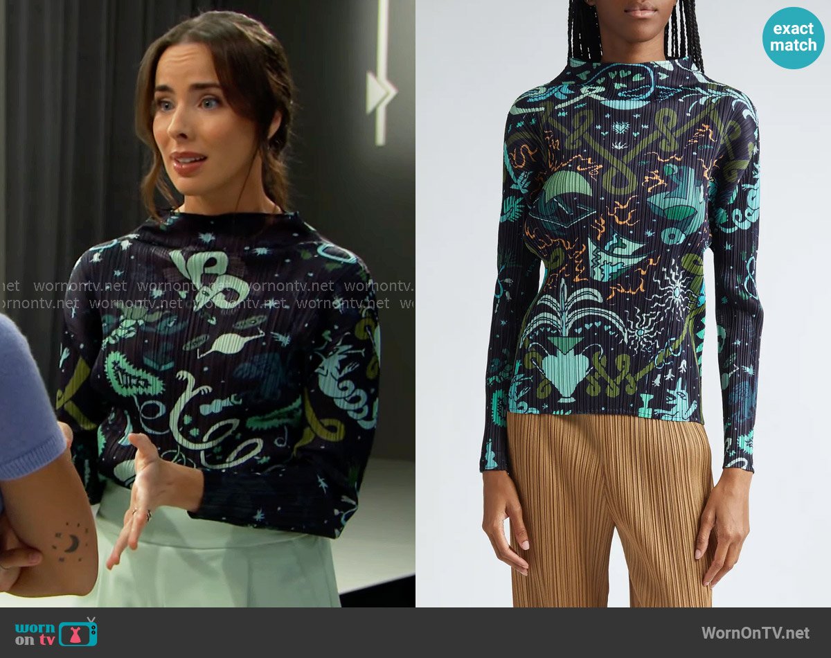Issey Miyake Interplanetary Print Pleated Funnel Neck Top worn by Ivy Forrester (Ashleigh Brewer) on The Bold and the Beautiful