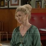 Jan’s green satin blouse on Beyond the Gates