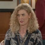 Jan’s blue zebra print shirt on Beyond the Gates