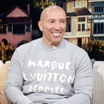 Jason Oppenheim’s gray sweater on Access Hollywood