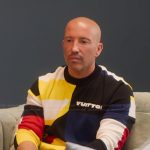 Jason’s colorblock sweater on Selling Sunset