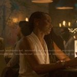 Jax’s white sleeveless wrap top on Reasonable Doubt