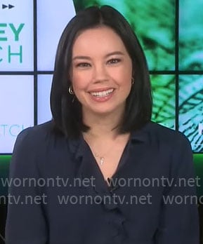 Jo Ling Kent's navy scalloped trim top on CBS Mornings