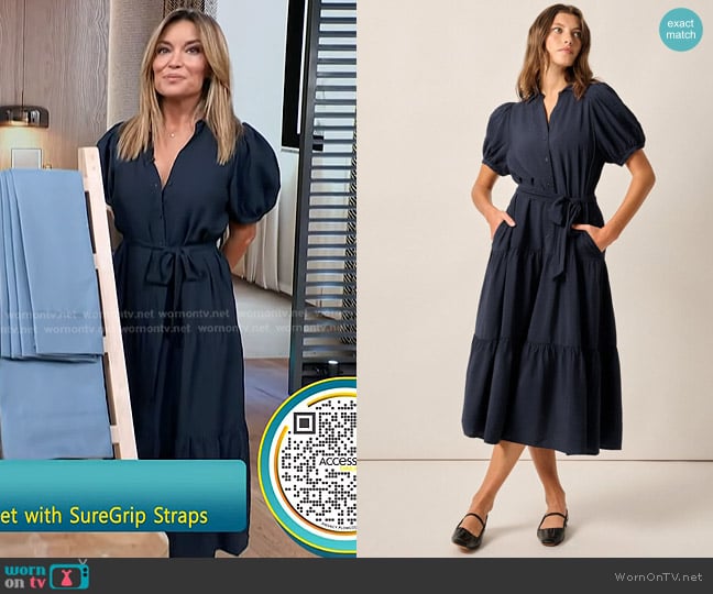 Kit’s navy puff sleeve midi dress on Access Hollywood