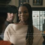 Julia’s ivory ribbed off-shoulder sweater on Elsbeth