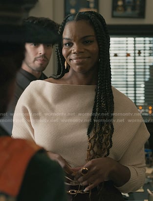 Julia's ivory ribbed off-shoulder sweater on Elsbeth