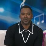 Justin’s black contrast trim zip polo on Today