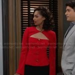 Kat’s red cutout jacket with gold buttons on Beyond the Gates