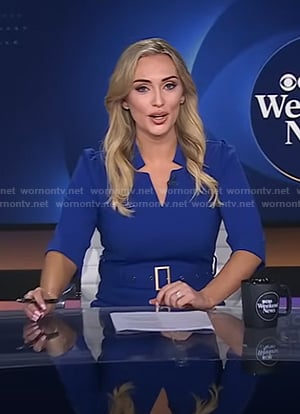Kelly O’Grady's blue belted v-neck dress on CBS Evening News
