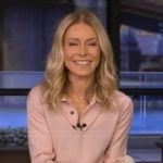Kelly's pink polo sweater on Live with Kelly and Mark