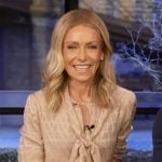 Kelly’s beige tie neck blouse on Live with Kelly and Mark