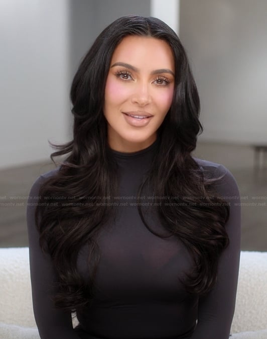 Kim's black mock neck confessional top on The Kardashians
