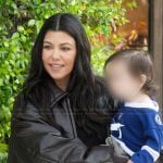 Kourtney’s black oversized leather jacket on The Kardashians