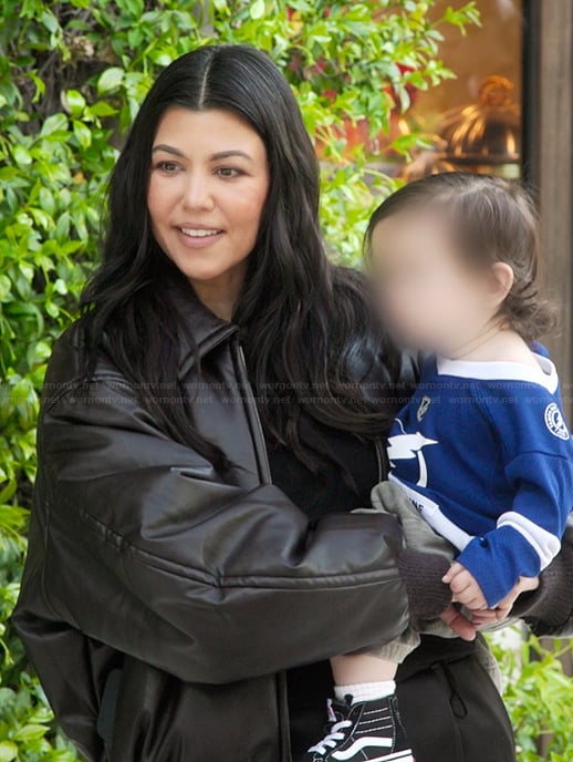 Kourtney's black oversized leather jacket on The Kardashians