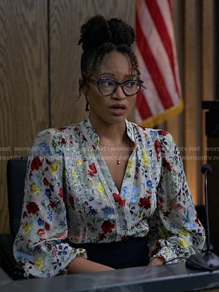 Kristin’s floral blouse on Reasonable Doubt