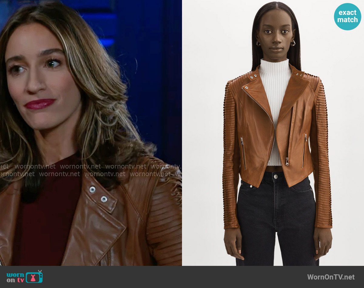 Ashley’s tan leather jacket on Beyond the Gates Ashley’s tan leather jacket on Beyond the Gates