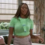 Laura’s green sweater set and tweed skirt on Beyond the Gates