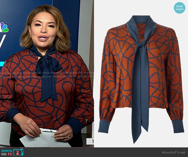 LK Bennett Lucille Rope Print Silk Tie Neck Blouse in Orange worn by Gilma Avalos on NBC News Daily