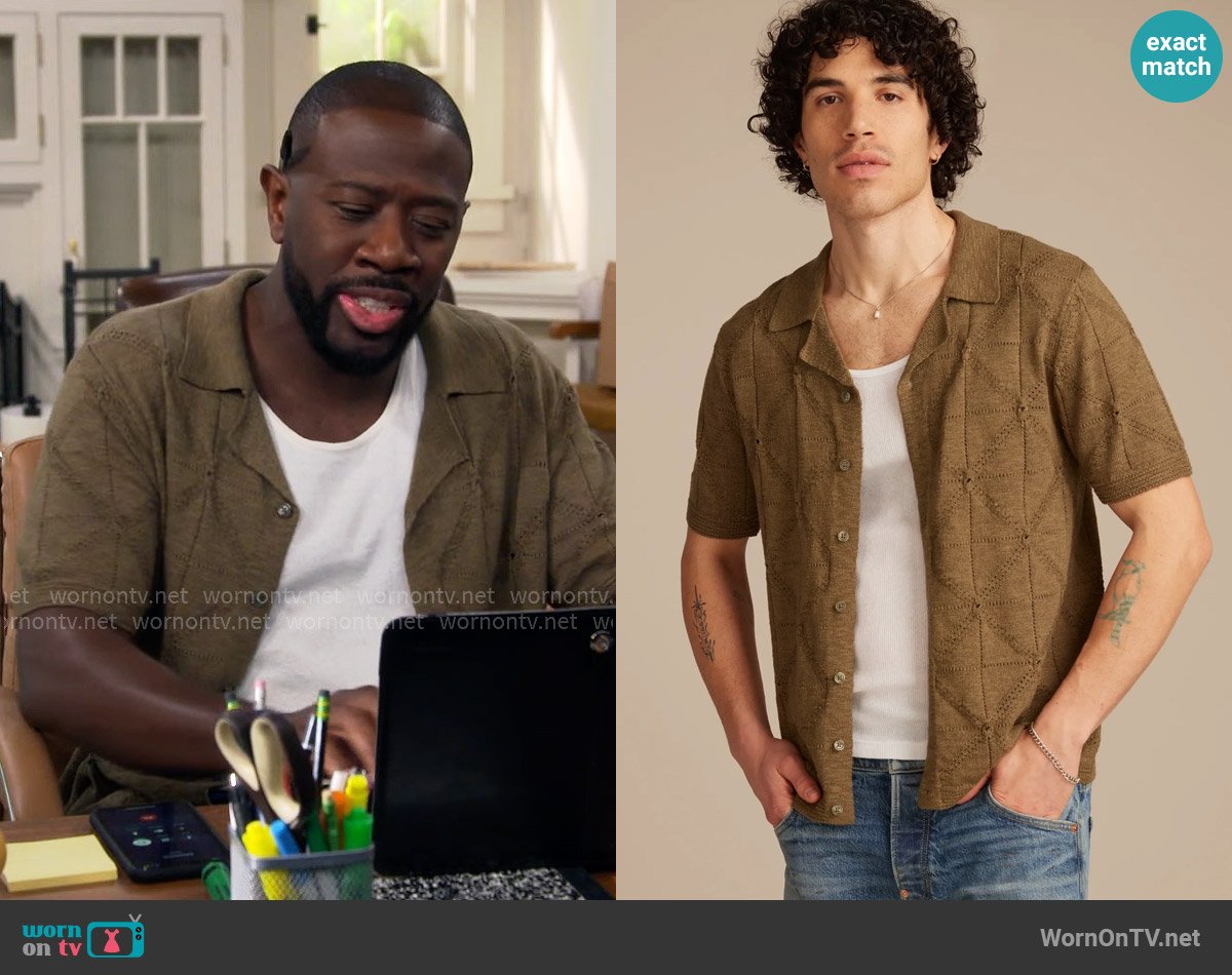 Malcolm’s olive knit shirt on The Neighborhood