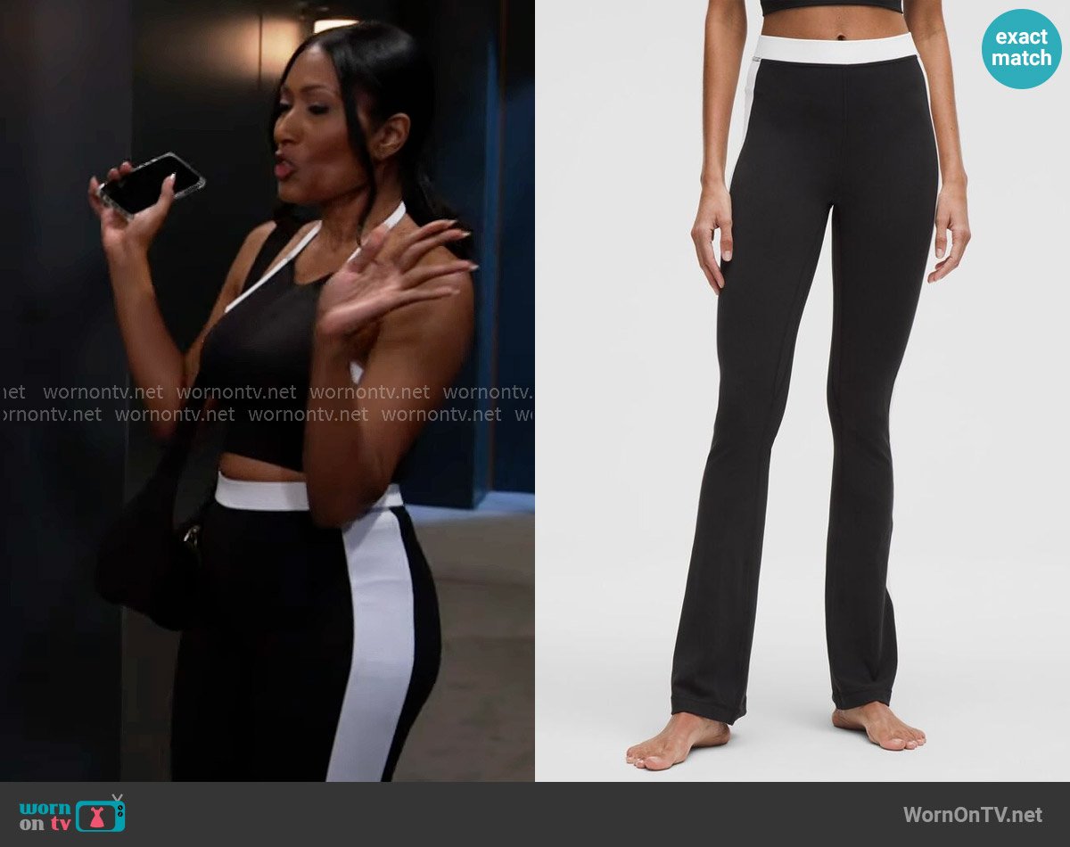 Lululemon Nulu High-Rise Flared Pant in Black / White worn by Dana 'Leslie' Thomas (Trisha Mann-Grant) on Beyond the Gates